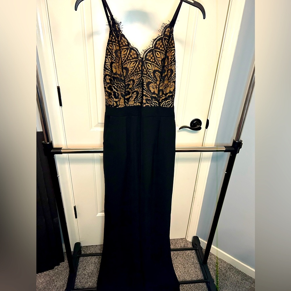 Super classy, long black romper